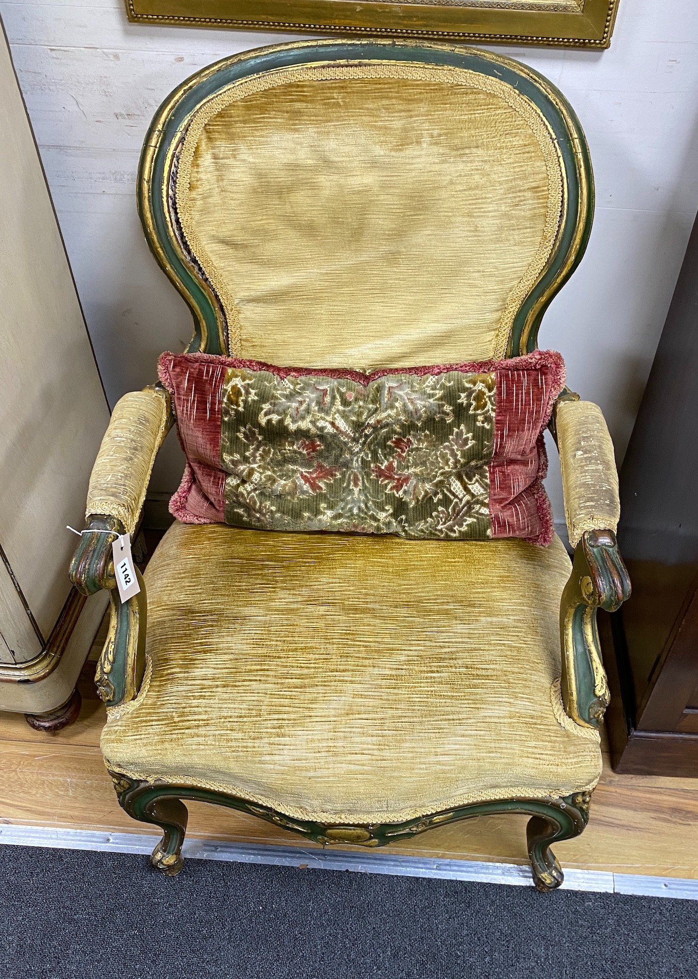 A 19th century French upholstered elbow chair, re-painted, width 60cm, depth 64cm, height 85cm